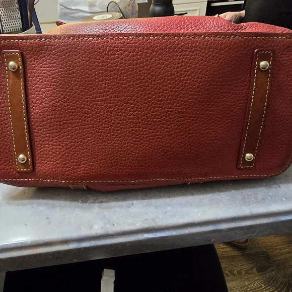Beautiful red leather Dooney & Bourke purse with crossbody option